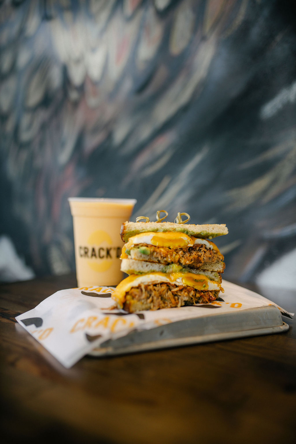 Shredded sandwich with melted cheese and vegetables